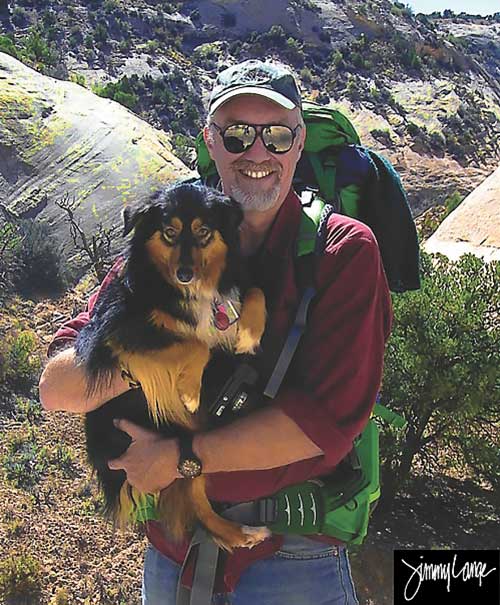 Photo of artist and author Jimmy Lange with his dog Penny